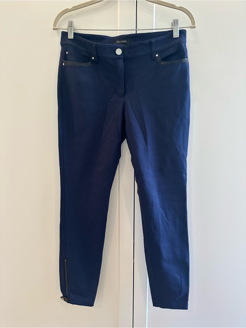 White House Black Market Navy Skinny Pants with black faux leather trim